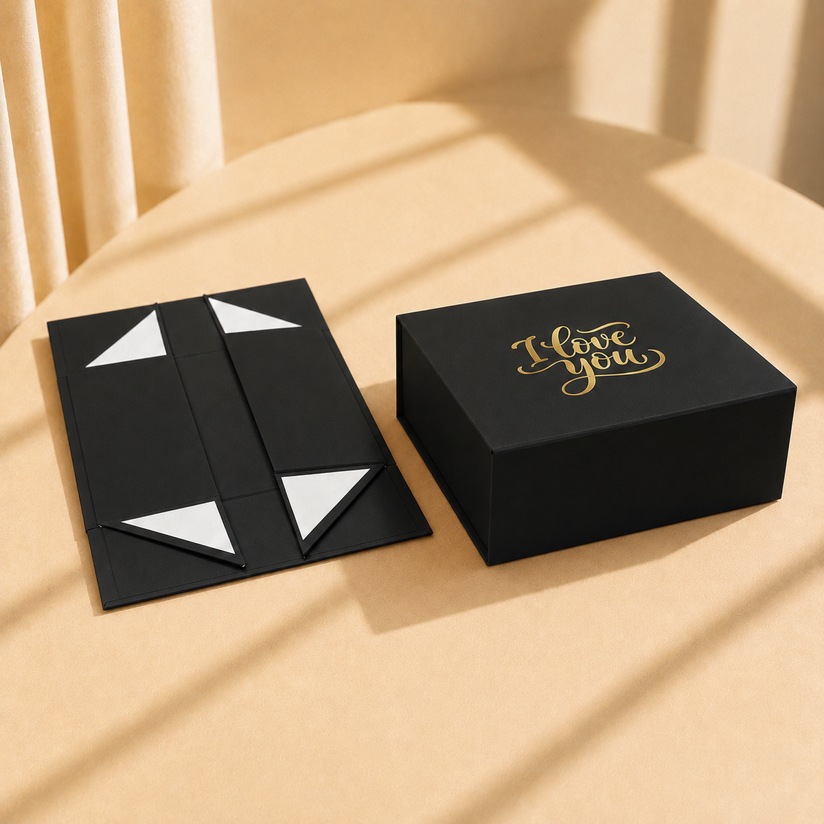 Black foldable gift box with gold "I Love You" foil print, shown flat and assembled