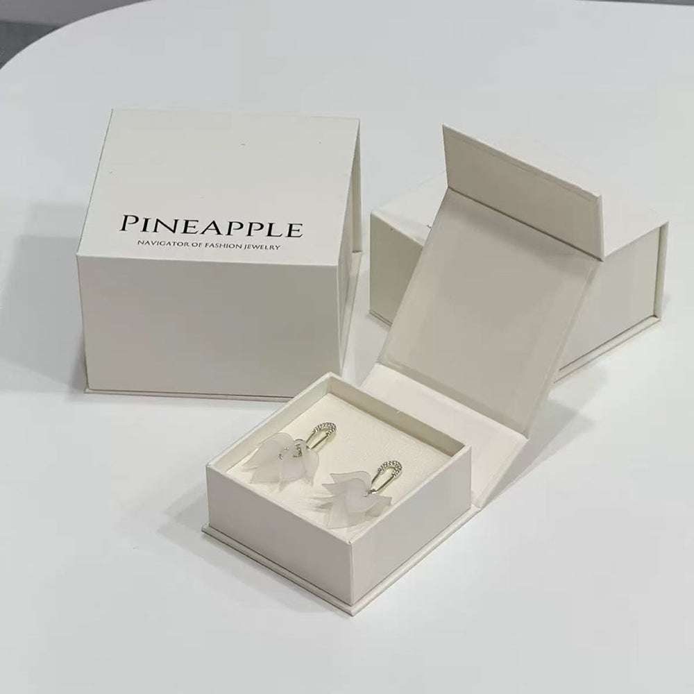Custom book-style magnetic rigid box for beauty and cosmetic packaging