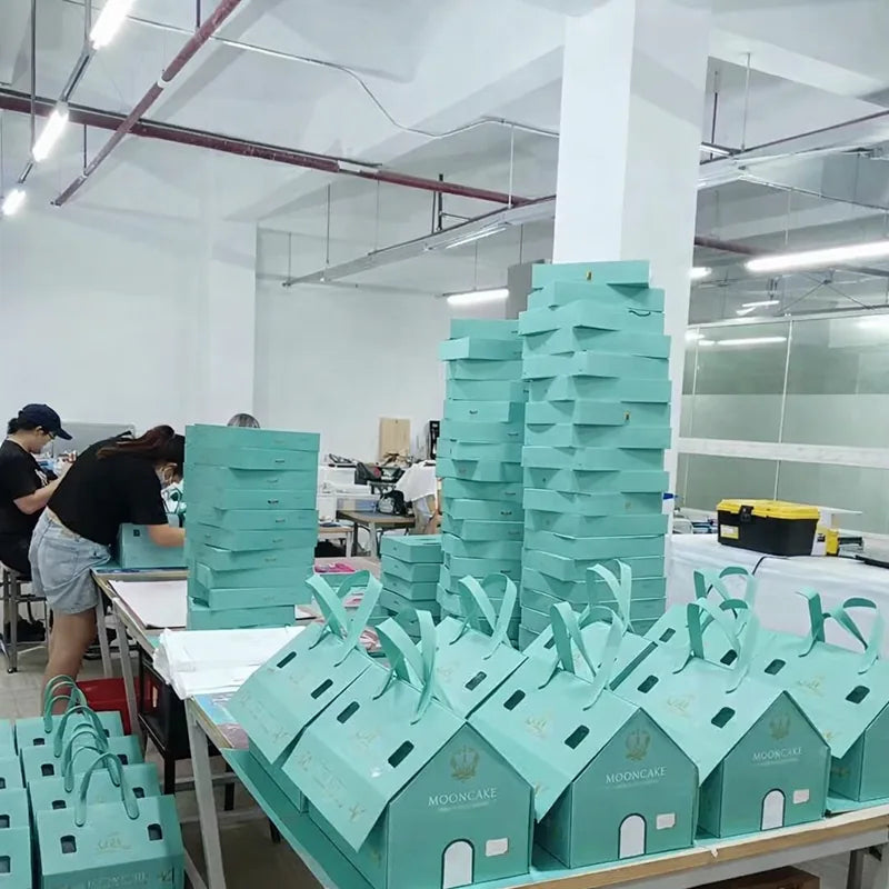 Finished gift packaging arranged for production checks